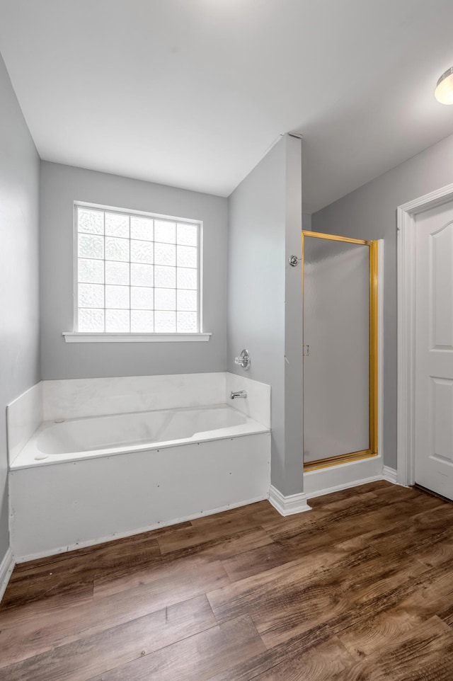 2916 Sandersville Rd, Lexington, KY 40511 - full bath with a garden tub, a shower stall, and wood finished floors