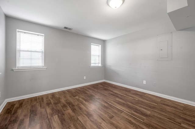 2916 Sandersville Rd, Lexington, KY 40511 - empty room with dark wood-type flooring and electric panel