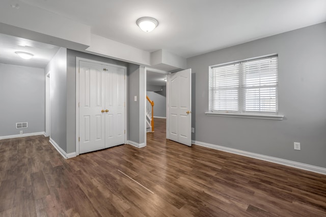 2916 Sandersville Rd, Lexington, KY 40511 - unfurnished bedroom with wood finished floors and a closet