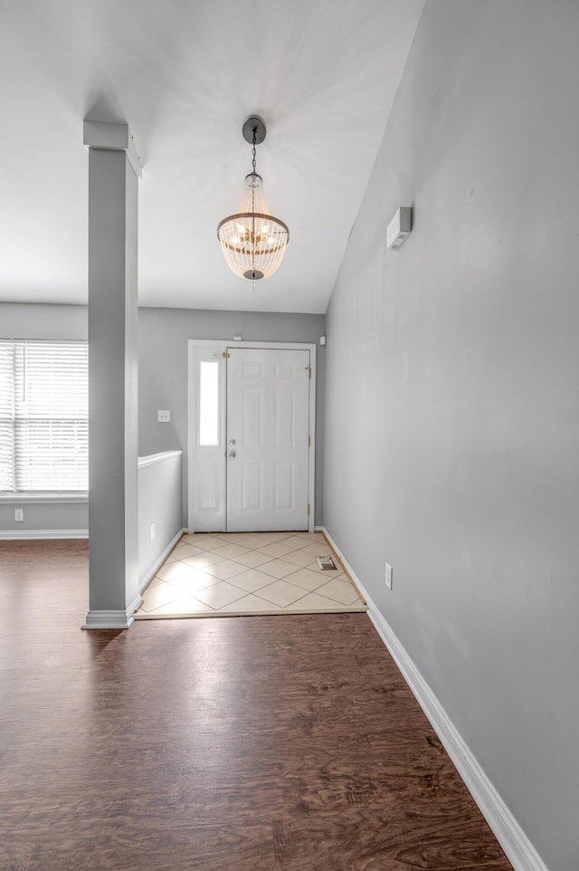 2916 Sandersville Rd, Lexington, KY 40511 - tiled entrance foyer with a chandelier and baseboards