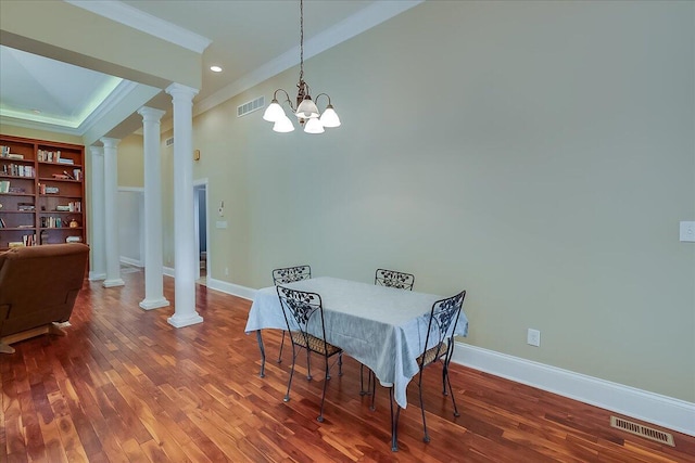 1758 Airdrie Ln, Frankfort, KY 40601 - dining space featuring ornamental molding, ornate columns, wood finished floors, and a chandelier