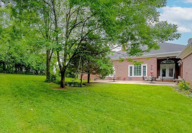 1758 Airdrie Ln, Frankfort, KY 40601 - view of green lawn with french doors and a patio area