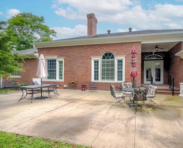 1758 Airdrie Ln, Frankfort, KY 40601 - rear view of house with brick siding, a chimney, outdoor dining space, and a patio