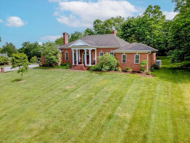 1758 Airdrie Ln, Frankfort, KY 40601 - neoclassical / greek revival house with a chimney, a front yard, and brick siding
