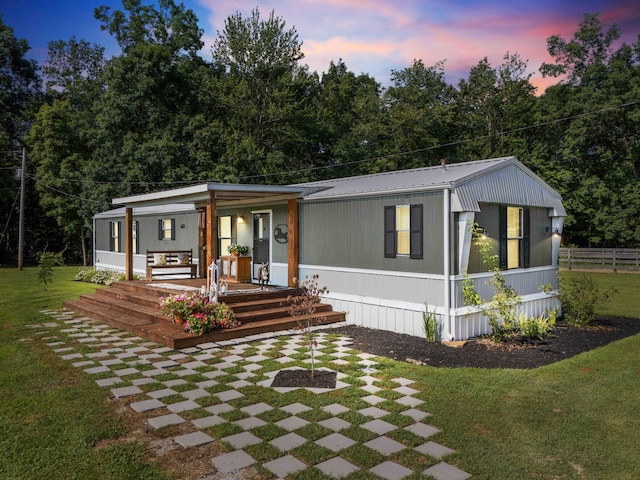 1100 Doublegate Rd, Jeffersonville, KY 40337 - manufactured / mobile home featuring covered porch and a metal roof