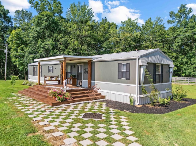 1100 Doublegate Rd, Jeffersonville, KY 40337 - manufactured / mobile home with a porch and a metal roof