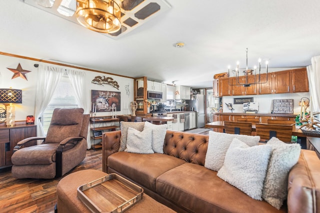 1100 Doublegate Rd, Jeffersonville, KY 40337 - living area featuring a chandelier, dark wood-style flooring, vaulted ceiling, and crown molding