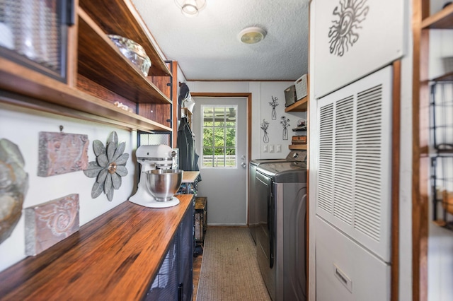 1100 Doublegate Rd, Jeffersonville, KY 40337 - laundry area with washer and dryer, a textured ceiling, and a heating unit