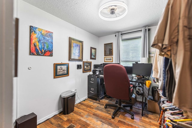 1100 Doublegate Rd, Jeffersonville, KY 40337 - office area with a textured ceiling and dark wood-style floors