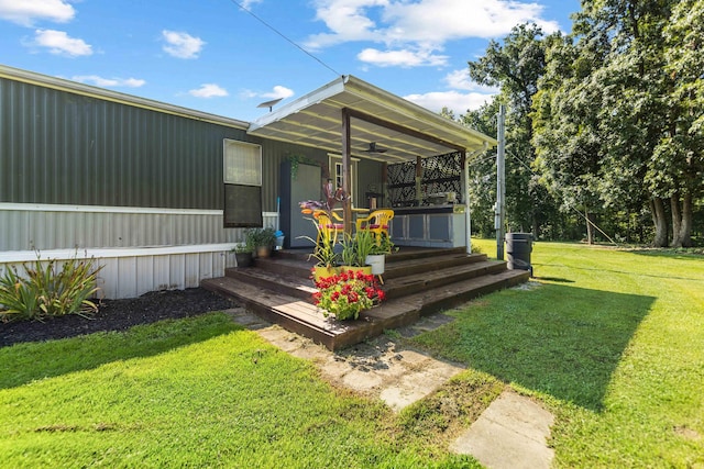 1100 Doublegate Rd, Jeffersonville, KY 40337 - wooden porch with ceiling fan and a lawn
