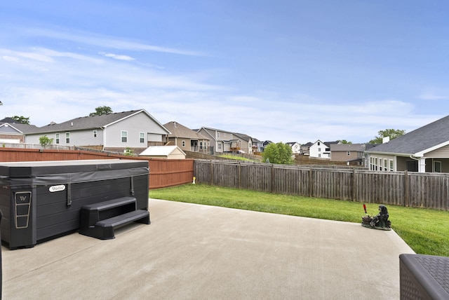 176 Cross Park Dr, Georgetown, KY 40324 - fenced backyard featuring a residential view, a hot tub, and a patio