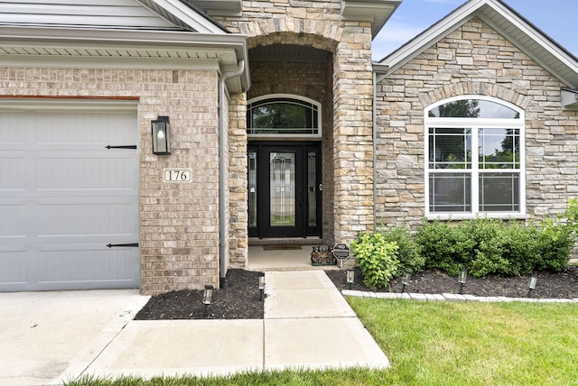 176 Cross Park Dr, Georgetown, KY 40324 - view of exterior entry featuring stone siding and a garage