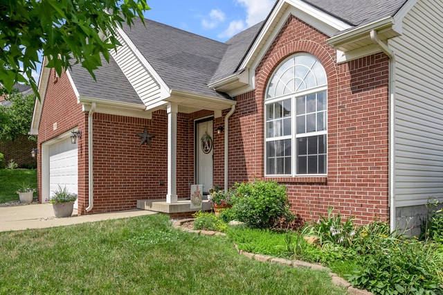 1701 Keating Dr, Louisville, KY 40245 - single story home with brick siding, a shingled roof, a garage, a front lawn, and concrete driveway