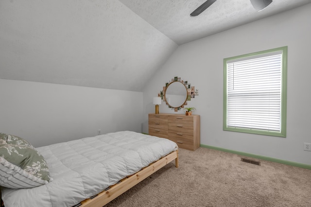 1701 Keating Dr, Louisville, KY 40245 - bedroom with vaulted ceiling, carpet, a textured ceiling, and ceiling fan