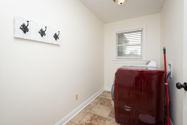 5045 Mccowans Ferry Rd, Versailles, KY 40383 - washroom featuring washer / clothes dryer and light stone finish flooring