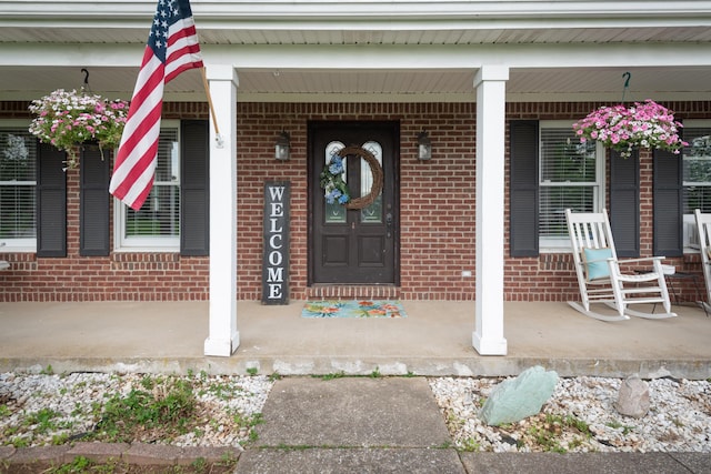 5045 Mccowans Ferry Rd, Versailles, KY 40383 - entrance to property with a porch and brick siding