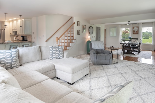 5045 Mccowans Ferry Rd, Versailles, KY 40383 - living area with stairway, light wood-style flooring, a ceiling fan, and recessed lighting