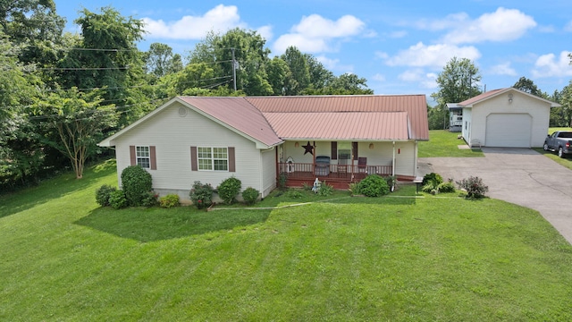 4107 Mine 18 Rd, Strunk, KY 42649 - view of front facade with a porch, a front lawn, asphalt driveway, and a metal roof