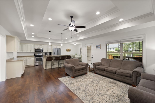 477 Barrington Dr, Somerset, KY 42503 - living room with a tray ceiling, ornamental molding, ceiling fan, dark wood-type flooring, and recessed lighting