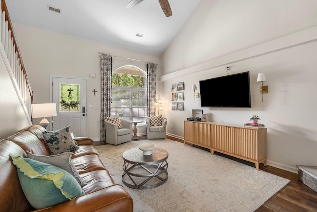 2193 Birkdale Dr, Lexington, KY 40509 - living area with high vaulted ceiling, wood finished floors, ceiling fan, and stairs