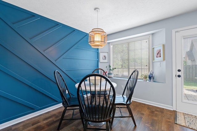 2193 Birkdale Dr, Lexington, KY 40509 - dining room with a chandelier, dark wood-type flooring, and a textured ceiling