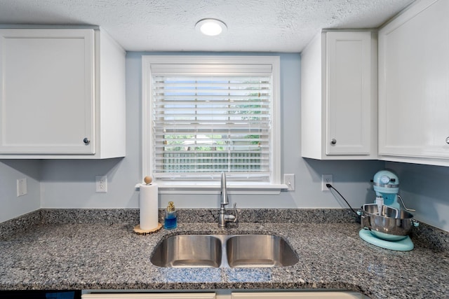 2193 Birkdale Dr, Lexington, KY 40509 - kitchen featuring white cabinets, a textured ceiling, and dark stone countertops