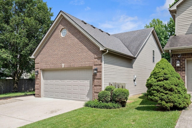 2193 Birkdale Dr, Lexington, KY 40509 - view of property exterior featuring brick siding, concrete driveway, a garage, and a shingled roof