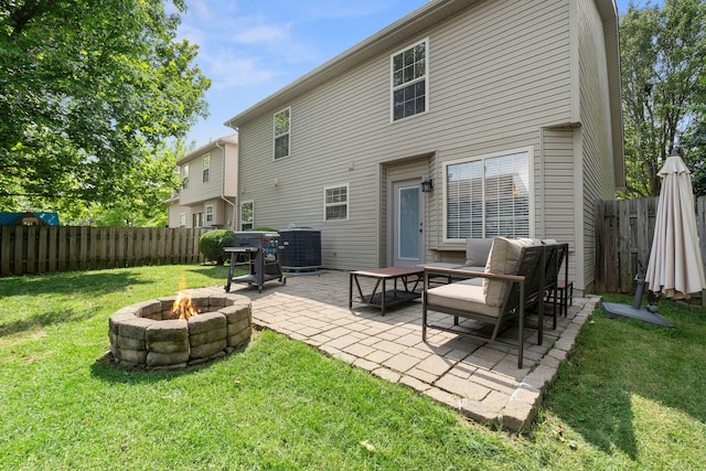 2193 Birkdale Dr, Lexington, KY 40509 - rear view of property with an outdoor fire pit, a patio area, and a fenced backyard