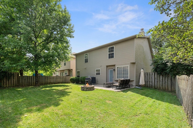 2193 Birkdale Dr, Lexington, KY 40509 - rear view of property with a fire pit, a fenced backyard, a chimney, and a patio area