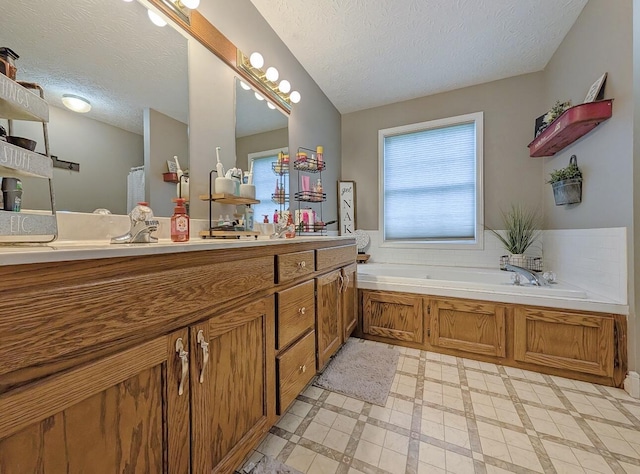 109 Edwards Ct, Lancaster, KY 40444 - full bath with double vanity, a textured ceiling, and a garden tub