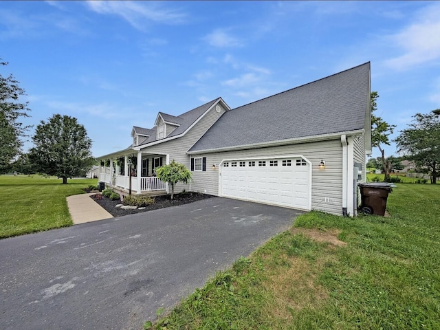 109 Edwards Ct, Lancaster, KY 40444 - cape cod-style house featuring a porch, asphalt driveway, an attached garage, and a front yard