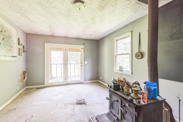 30 Country Ln, Prestonsburg, KY 41653 - entryway featuring a wood stove and baseboards