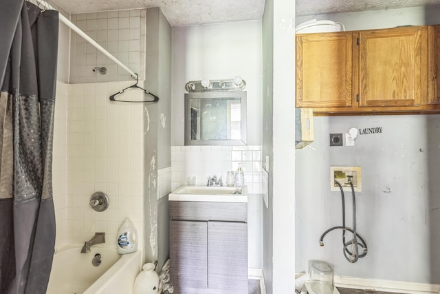 30 Country Ln, Prestonsburg, KY 41653 - full bath featuring vanity, shower / bath combo, tile walls, and a textured ceiling