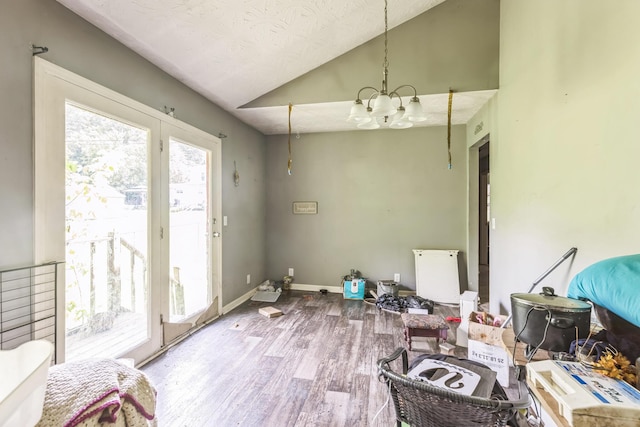 30 Country Ln, Prestonsburg, KY 41653 - dining space with vaulted ceiling, wood finished floors, and a chandelier
