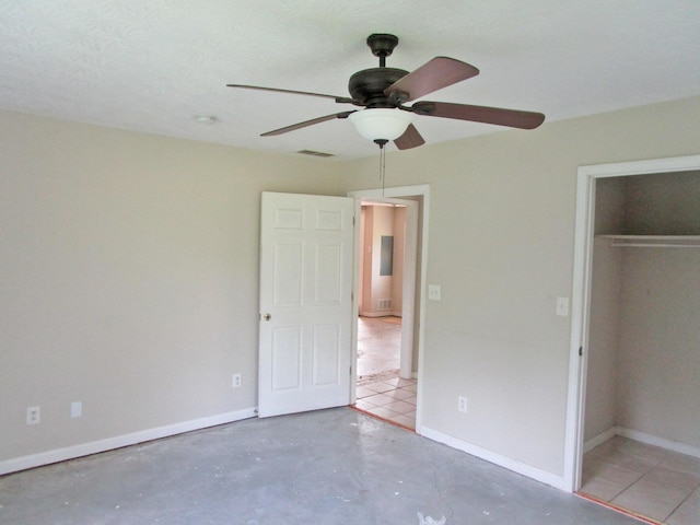 4000 Shadrick Ferry Rd, Frankfort, KY 40601 - unfurnished bedroom featuring concrete flooring, a closet, and a ceiling fan