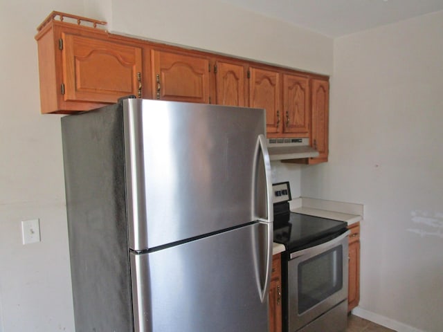 4000 Shadrick Ferry Rd, Frankfort, KY 40601 - kitchen featuring stainless steel appliances, under cabinet range hood, brown cabinetry, and light countertops