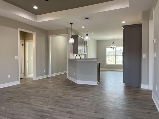 108 Aetna, Georgetown, KY 40324 - kitchen featuring open floor plan, dark wood finished floors, recessed lighting, a chandelier, and pendant lighting