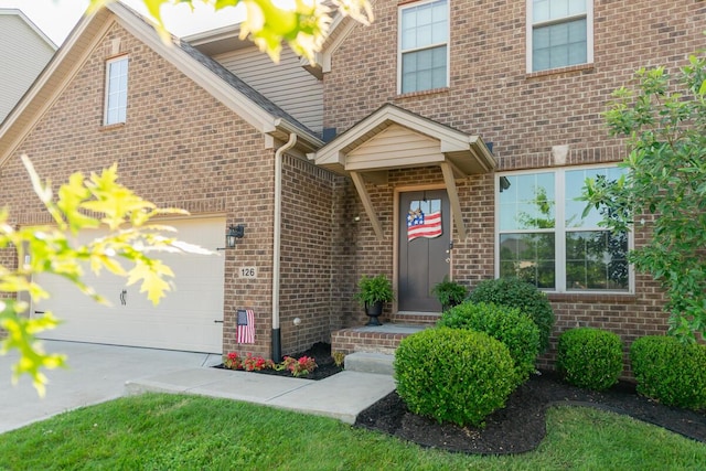 126 Mollie Way, Georgetown, KY 40324 - view of exterior entry featuring brick siding and driveway