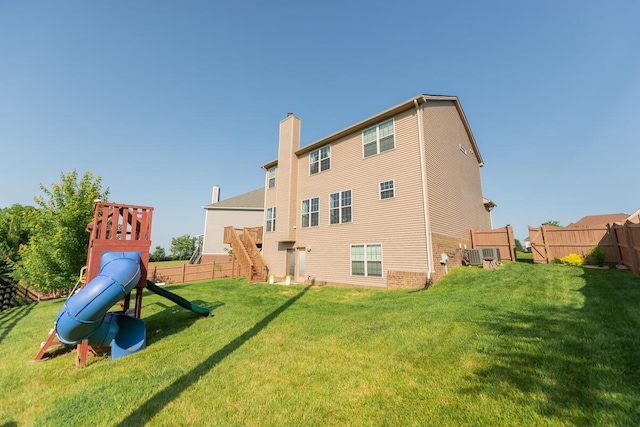 126 Mollie Way, Georgetown, KY 40324 - back of property featuring a playground and a chimney