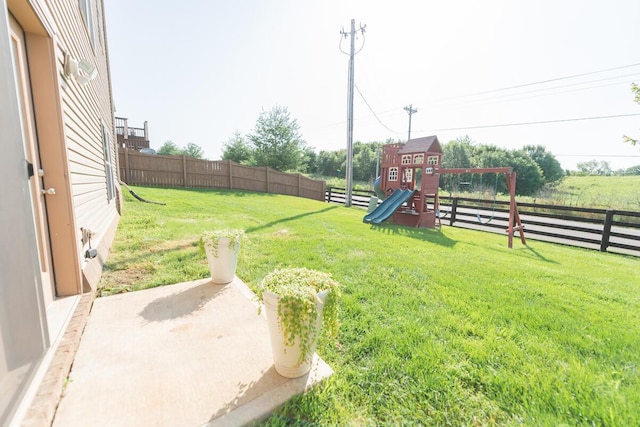 126 Mollie Way, Georgetown, KY 40324 - fenced backyard with a playground