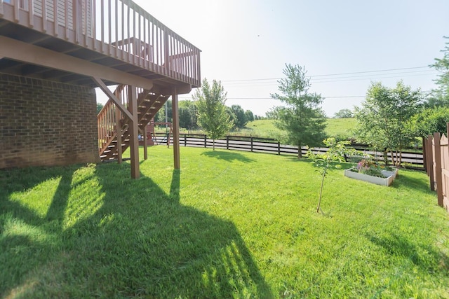 126 Mollie Way, Georgetown, KY 40324 - fenced backyard featuring stairway and a deck