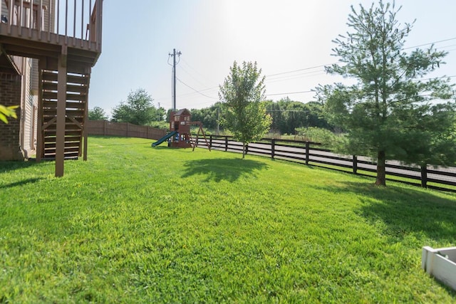 126 Mollie Way, Georgetown, KY 40324 - fenced backyard with a playground, stairs, and a wooden deck