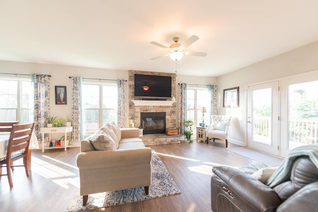 126 Mollie Way, Georgetown, KY 40324 - living area featuring wood finished floors, a stone fireplace, and a ceiling fan