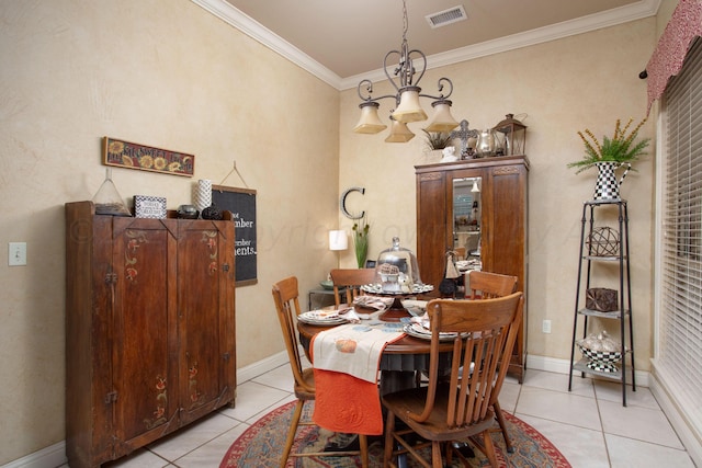 7705 New England Pkwy, Amarillo, TX 79119 - dining area featuring light tile patterned floors, visible vents, crown molding, and baseboards