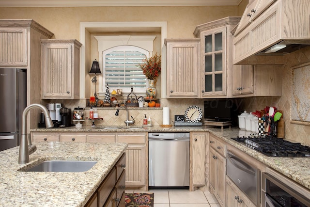 7705 New England Pkwy, Amarillo, TX 79119 - kitchen featuring a warming drawer, a sink, backsplash, and stainless steel appliances