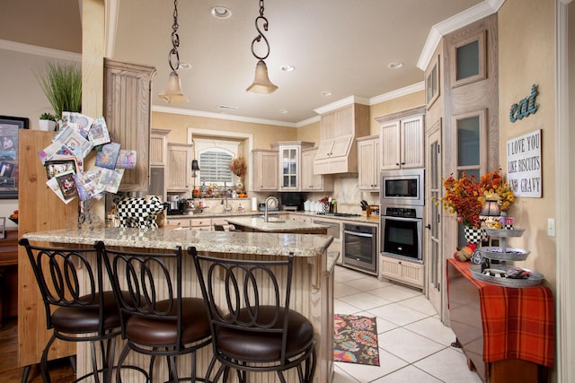 7705 New England Pkwy, Amarillo, TX 79119 - kitchen with light stone countertops, stainless steel appliances, glass insert cabinets, a kitchen breakfast bar, and a peninsula