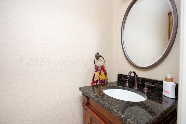 7705 New England Pkwy, Amarillo, TX 79119 - bathroom with a textured wall and vanity