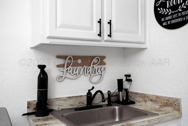 6106 Purple Sage Cir, Amarillo, TX 79124 - kitchen view of a sink and white cabinetry