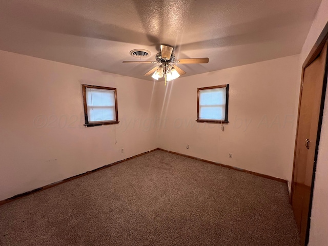 109 Ranger St, Hereford, TX 79045 - unfurnished room featuring plenty of natural light, carpet floors, ceiling fan, and baseboards