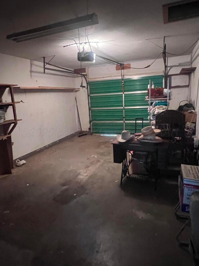 109 Ranger St, Hereford, TX 79045 - garage featuring a garage door opener